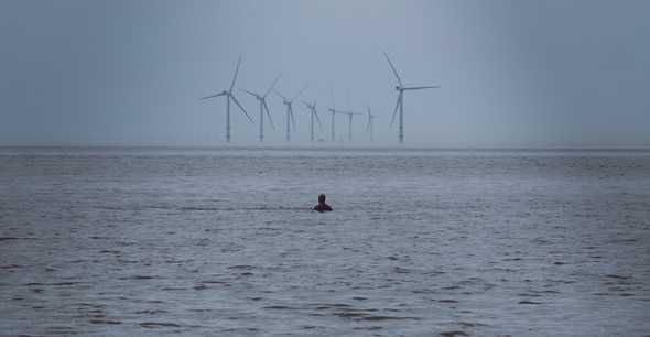 Swimmer with wind turbines